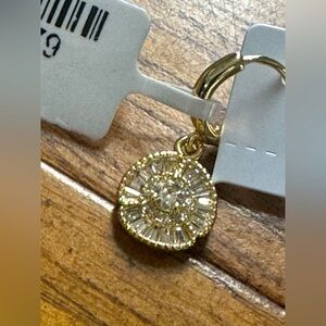 Gold plated earrings with sparkle stone center. Sparkling Accents. NWT $138